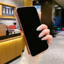 Load image into Gallery viewer, iPhone in the Luxury AG Glass case lying flat, showcasing the smooth and scratch-resistant surface.