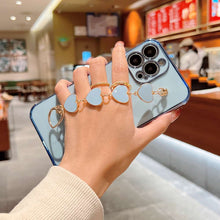 Load image into Gallery viewer, Soft TPU Handmade Bracelet iPhone Case, Blue In Hand Model Show