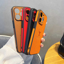 Load image into Gallery viewer, Deer Pattern Leather iPhone Case, Brown Red Black Orange Side View
